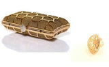 Zlata clutch torbica in prstan
